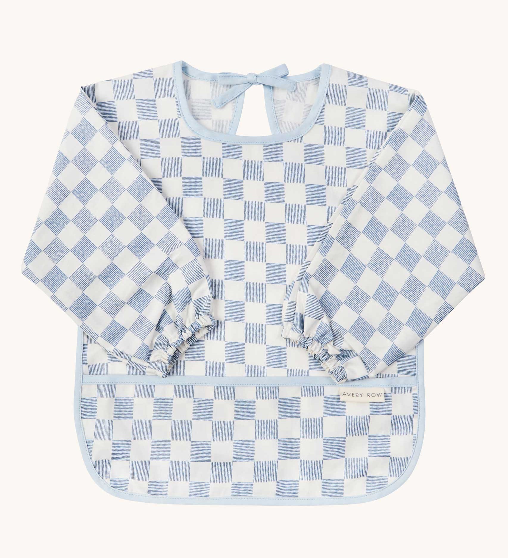 Avery Row Sleeved Bib with a check Waves design. This blue and white coloured bib has long sleeves with elasticated cuffs and features a pocket to help catch any food debris. We have a wide range of Avery Row stylish baby products available at Babipur. 
