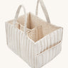 A Avery row nappy caddy organiser with a wild chamomile design on a cream background.