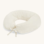A Avery Row soft nursing pillow with a wild chamomile design on a cream background.