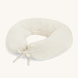 A Avery Row soft nursing pillow with a wild chamomile design on a cream background.