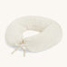 A Avery Row soft nursing pillow with a wild chamomile design on a cream background.