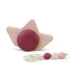Babai eco-friendly wooden pull and go ship toy on a white background