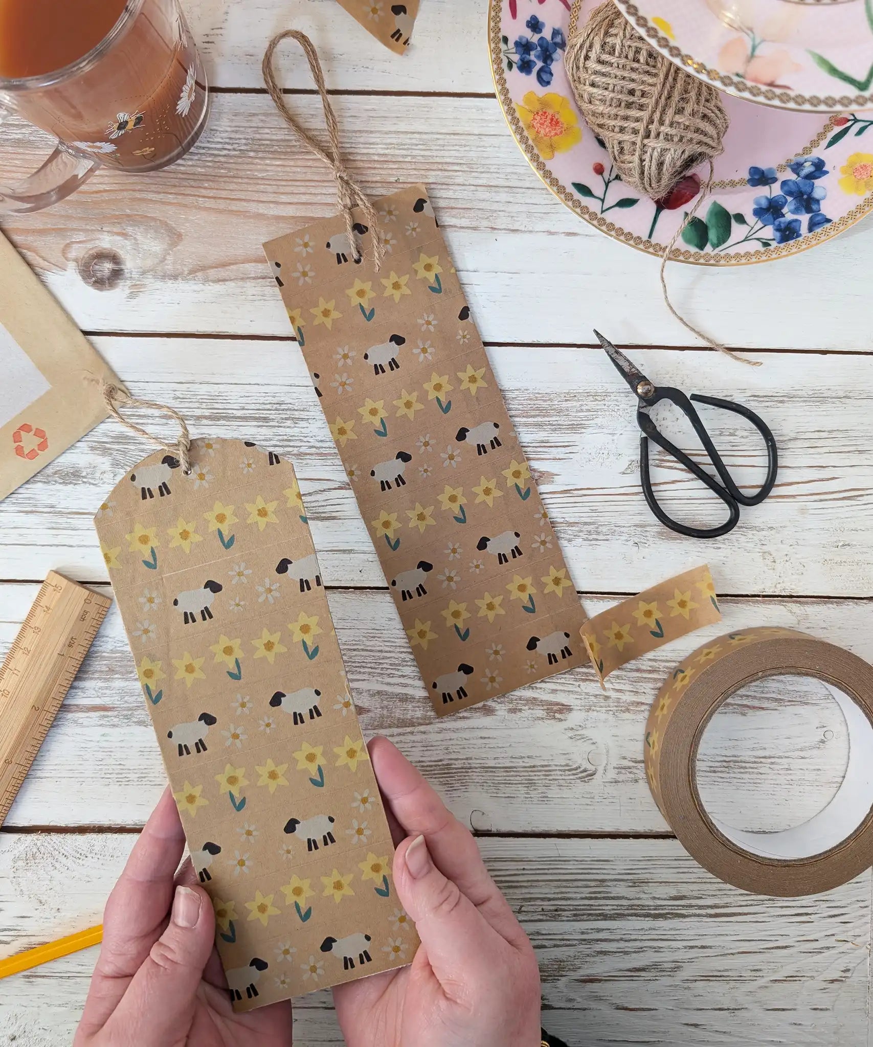 Babipur sheep and daisies and daffodils print kraft eco paper tapes used to create a DIY bookmarks with jute twine.