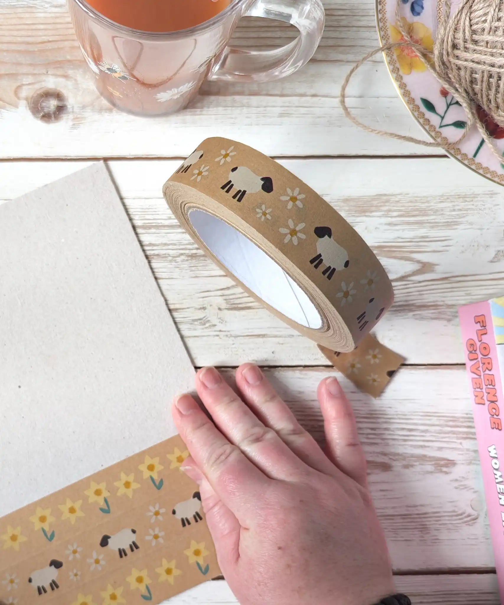 Babipur sheep and daisies print kraft paper tape being used in crafts.