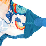 The velcro straps on The Close Pop-In x Babipur exclusive reusable nappy wrap, in a Babipur World print