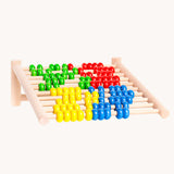Bajo 100 Bead Abacus counting toy shown laying on an angle. Perfect for use at a desk or lower surface. These heirloom quality toys by Bajo are part of a wide range of wooden toys available here at Babipur. 