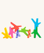 Bajo Acrobats balancing game. A set of 8 coloured wooden acrobat shaped figures. These heirloom quality toys by Bajo are part of a wide range of wooden toys available here at Babipur.