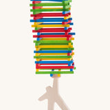 Bajo Athlete wooden stacking and balance game. A wooden toy figure used as a base to stack colourful slim wooden batons.