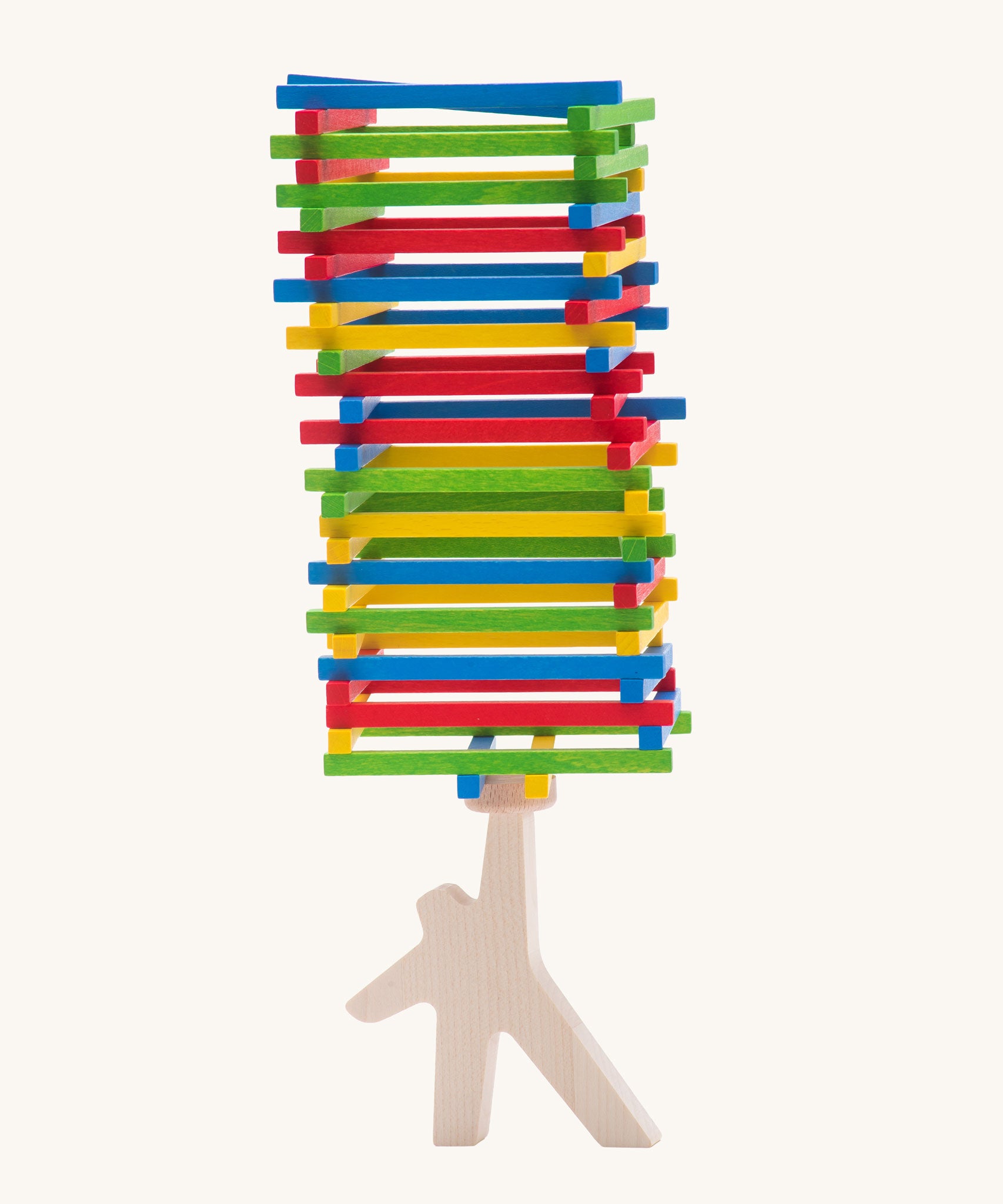 Bajo Athlete wooden stacking and balance game. A wooden toy figure used as a base to stack colourful slim wooden batons.
