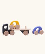 Bajo black auto car transporter vehicle with two cars. Yellow car is placed on the trailer, purple car placed behind the transporter.