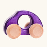 Bajo Beetle toy car in Violet purple, a wooden push-along toy for toddlers with a circular hand hole and natural wood wheels, available online from Babipur.