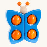 Bajo Blue Butterfly Teether wooden toy. A blue coloured butterfly with orange balls. These heirloom quality toys by Bajo are part of a wide range of wooden toys available here at Babipur. 