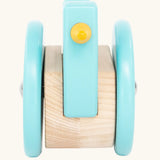 Front of the Bajo blue wobbling chicken wooden push along toy. 