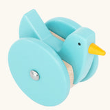 view of top of the Bajo blue wobbling chicken wooden push along toy. 