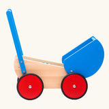 Side of the Bajo wooden dolls pram and walker with blue hood and handle. The hood has been tilted back.