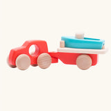 Bajo toys wooden car with boat and trailer. A coral red vehicle and trailer with a blue boat.