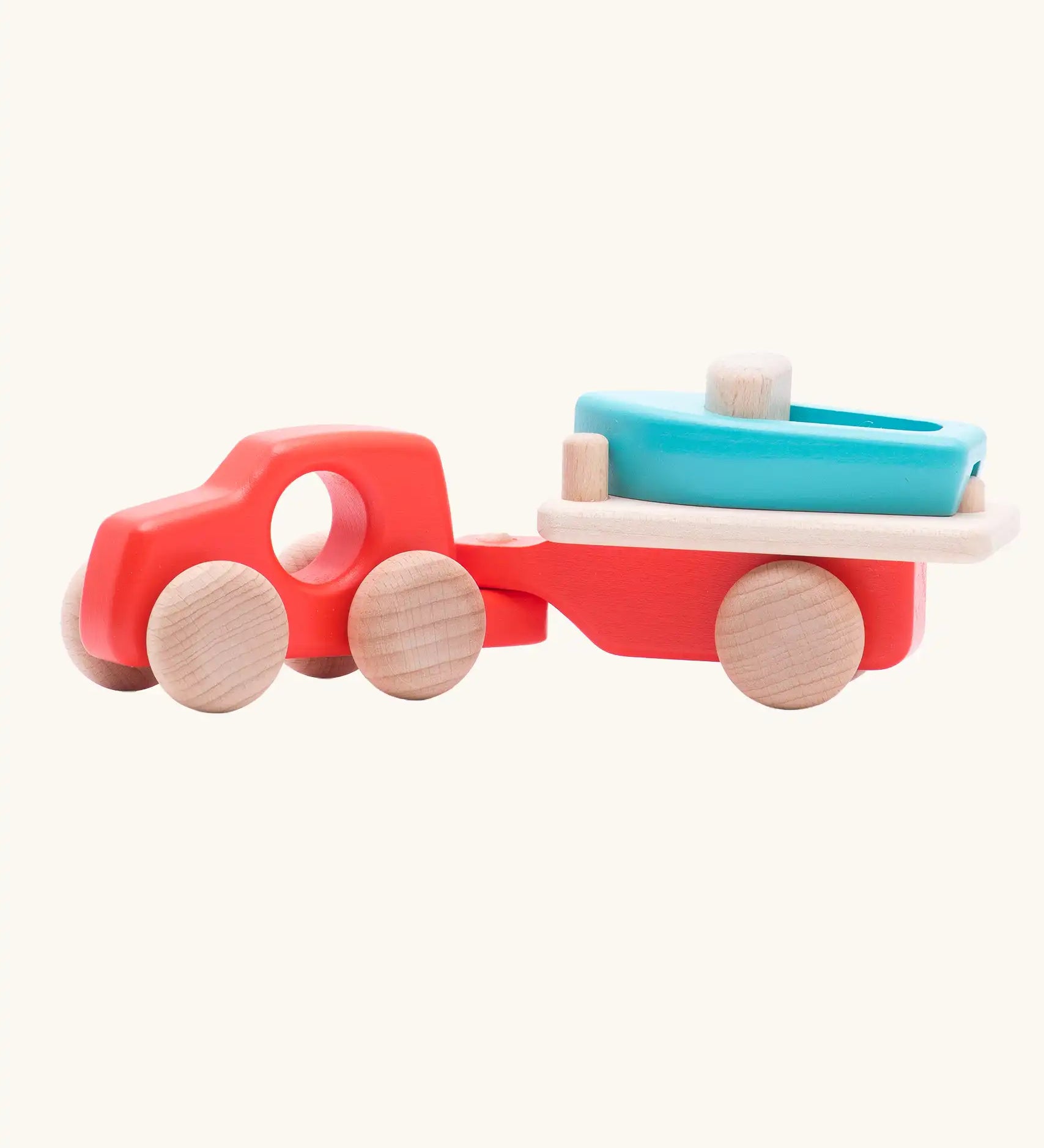 Bajo toys wooden car with boat and trailer. A coral red vehicle and trailer with a blue boat.