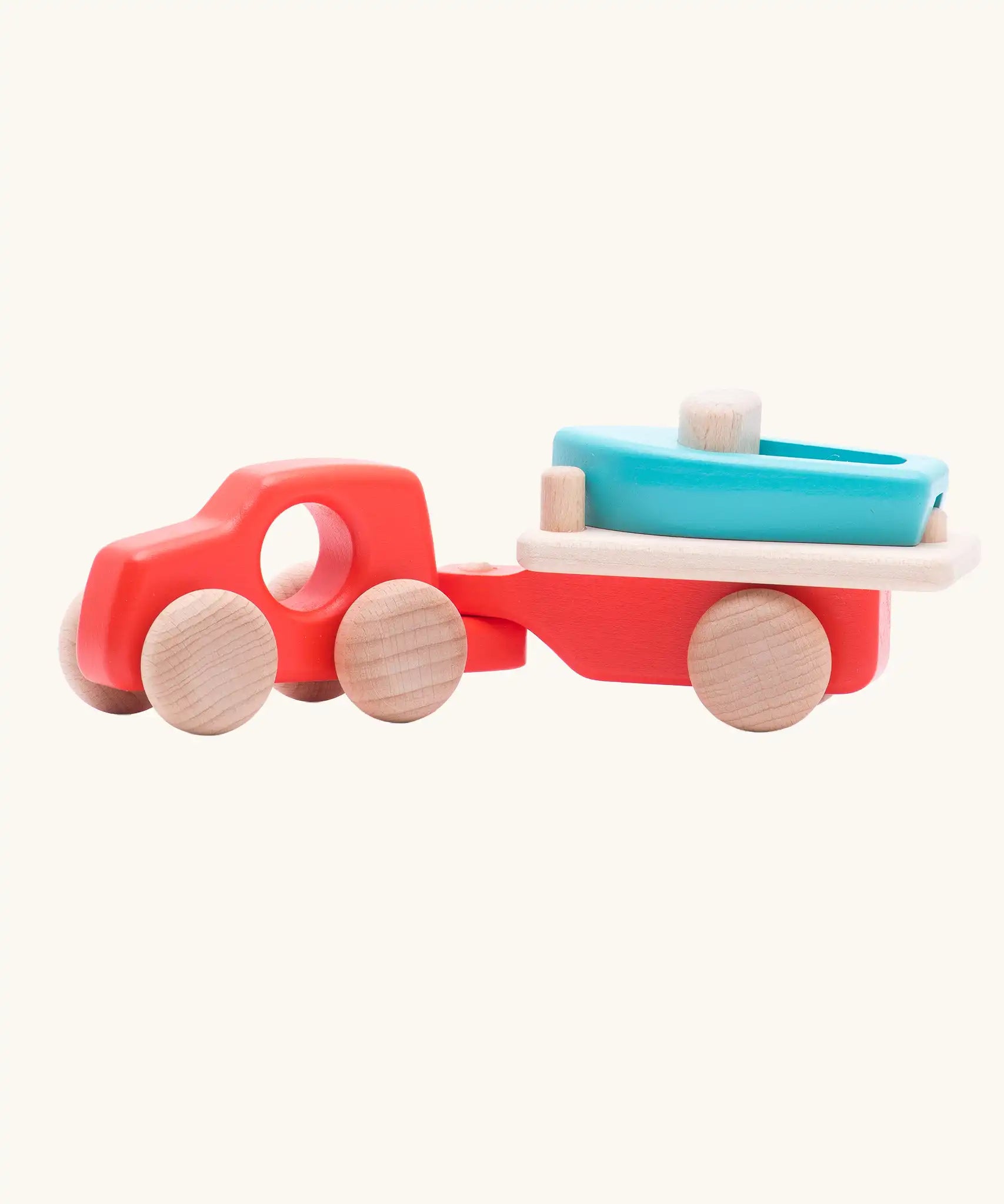 Bajo toys wooden car with boat and trailer. A coral red vehicle and trailer with a blue boat.