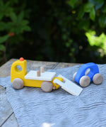 Bajo yellow breakdown lorry wooden toy with a blue coloured car.