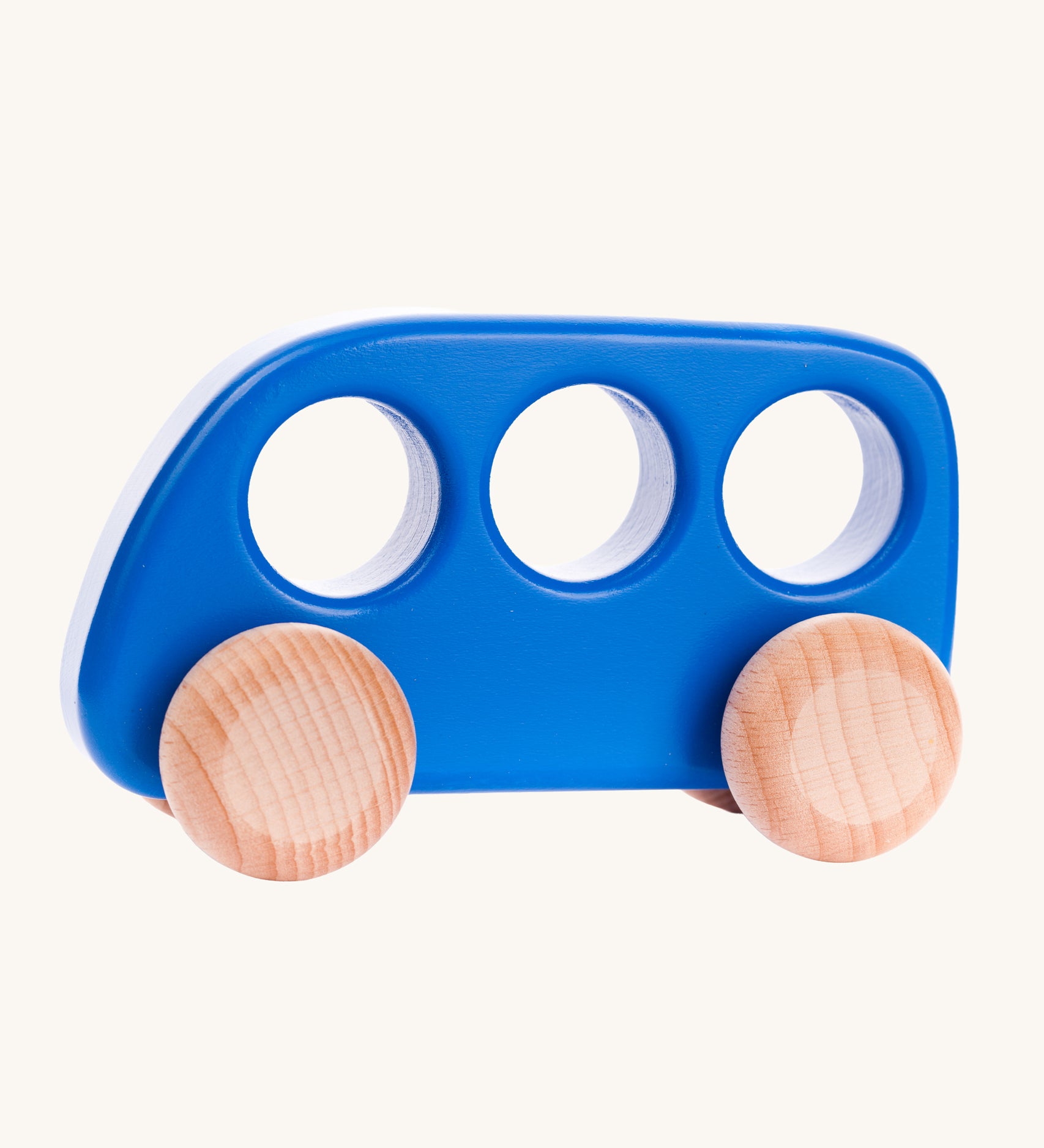 A Bajo blue coloured wooden push along bus toy. This bus is part of a wide range of Bajo wooden toy vehicles available at Babipur.