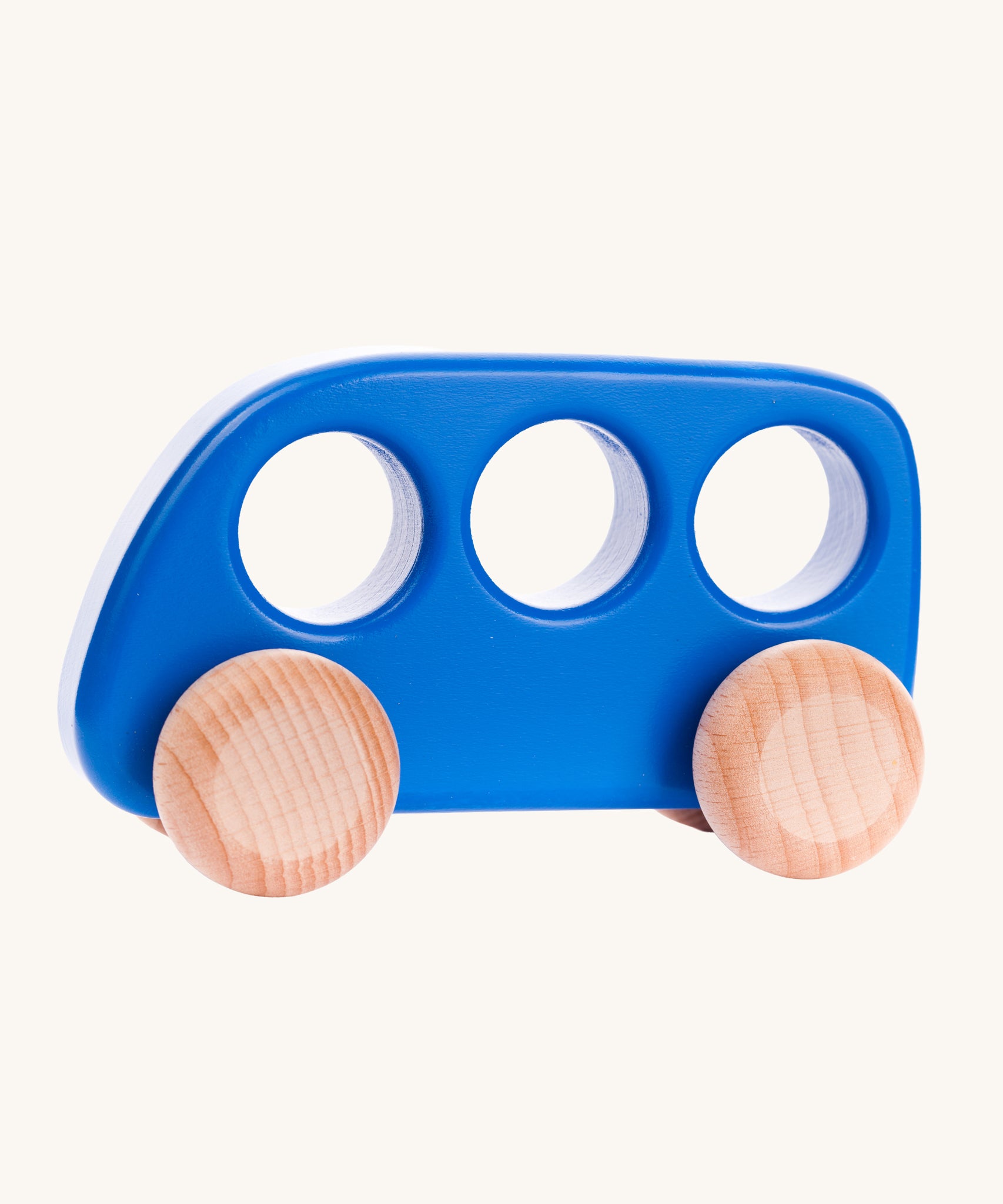 A Bajo blue coloured wooden push along bus toy. This bus is part of a wide range of Bajo wooden toy vehicles available at Babipur.