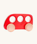 A Bajo red coloured wooden push along bus toy. This bus is part of a wide range of Bajo wooden toy vehicles available at Babipur.