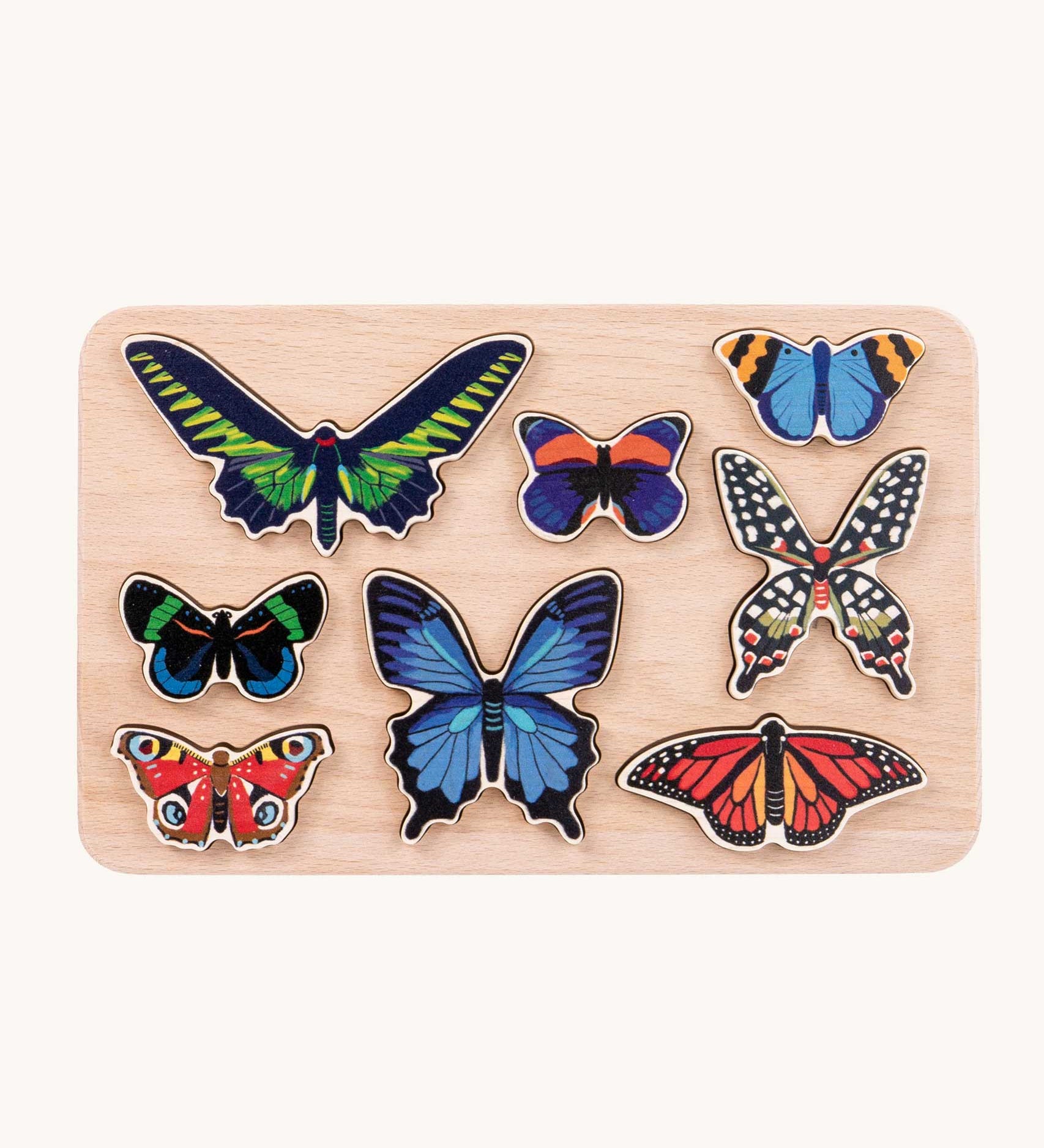 Bajo World Of Butterflies Sorter Puzzle. This puzzle has butterfly shaped pieces that are decorated on both sides that slot into the coordinating shapes on the base. These heirloom quality toys by Bajo are part of a wide range of wooden toys available here at Babipur.