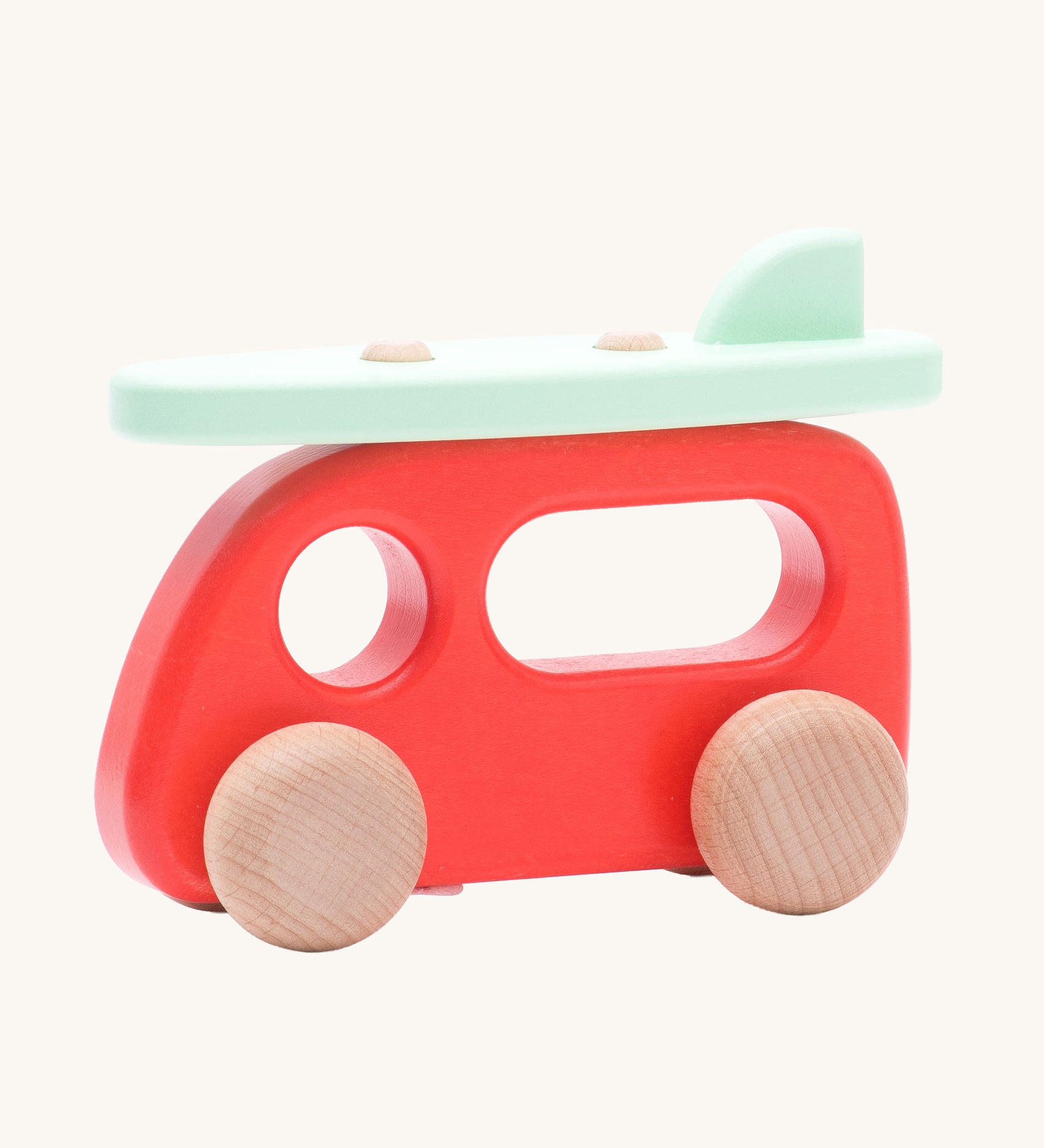 Bajo Camper Van With Surf Board wooden toy vehicle. This red camper van toy comes with a green coloured surf board that sits on the roof. 
These heirloom quality toys by Bajo are part of a wide range of wooden toys available here at Babipur. 