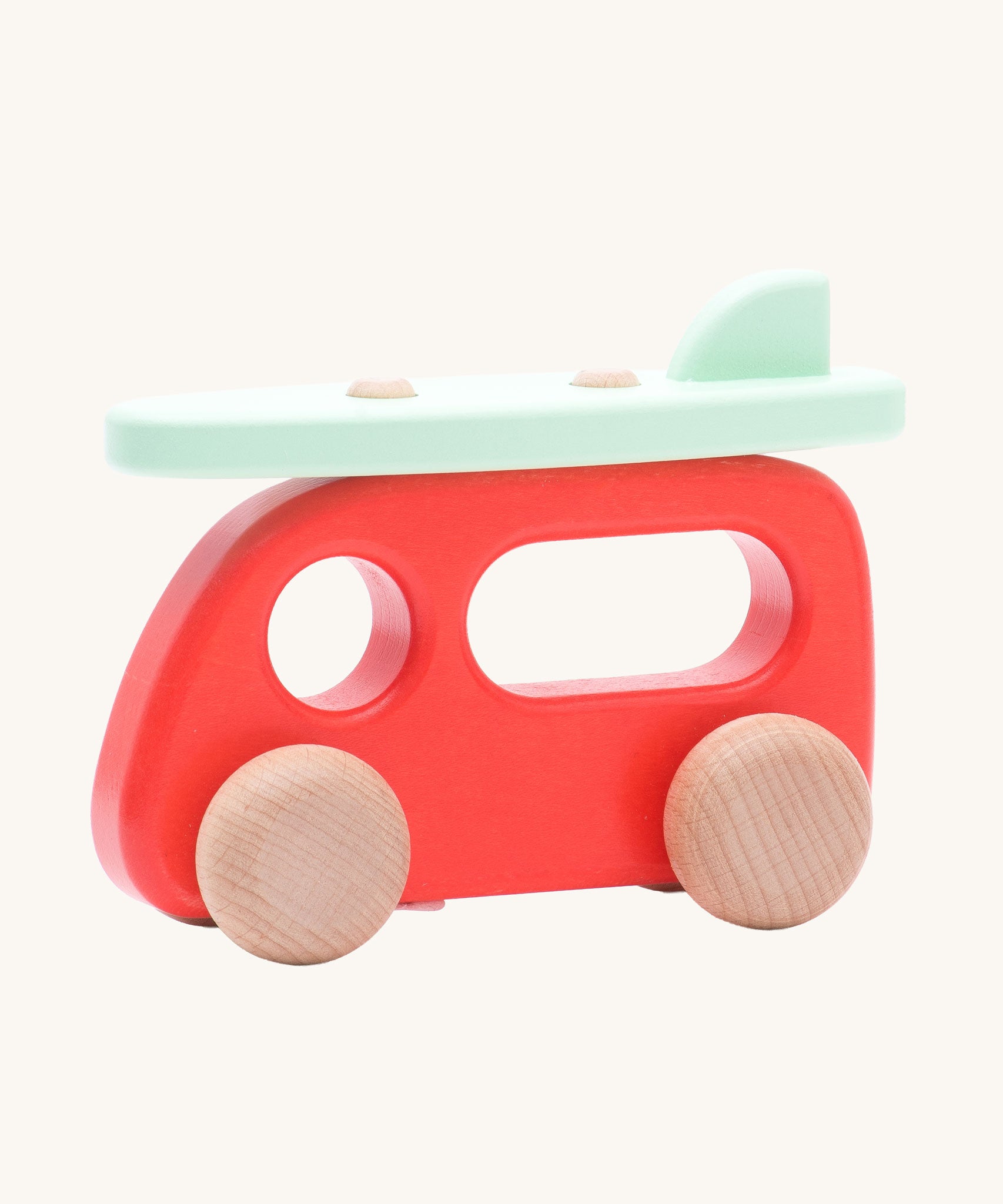 Bajo Camper Van With Surf Board wooden toy vehicle. This red camper van toy comes with a green coloured surf board that sits on the roof. 
These heirloom quality toys by Bajo are part of a wide range of wooden toys available here at Babipur. 