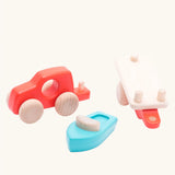 Bajo toys wooden car with boat and trailer. A coral red vehicle and trailer with a blue boat. All pieces have been taken apart.