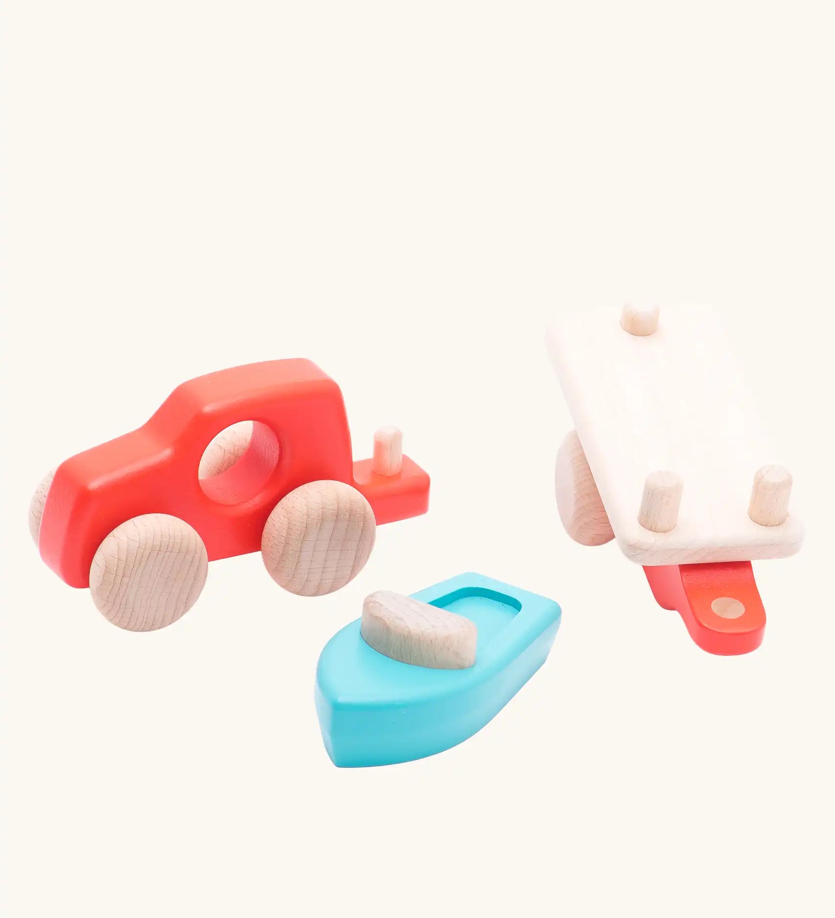 Bajo toys wooden car with boat and trailer. A coral red vehicle and trailer with a blue boat. All pieces have been taken apart.