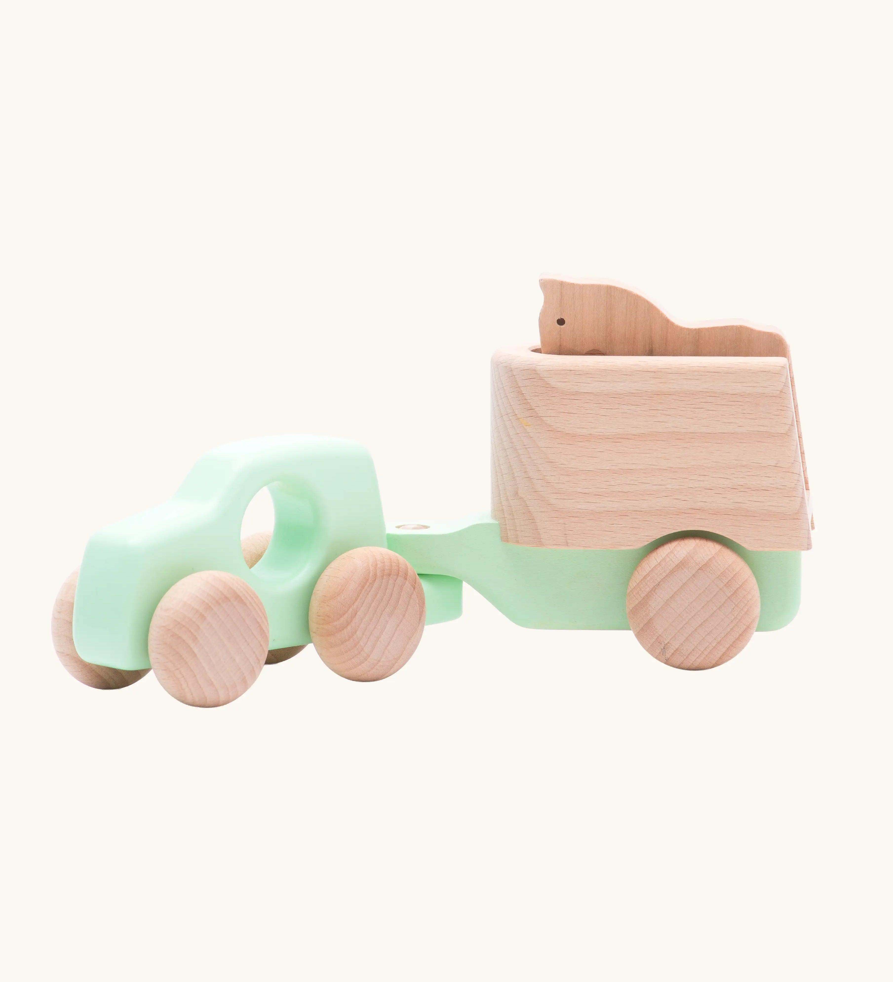 Bajo mint green 4x4 car and horse trailer wooden toy.