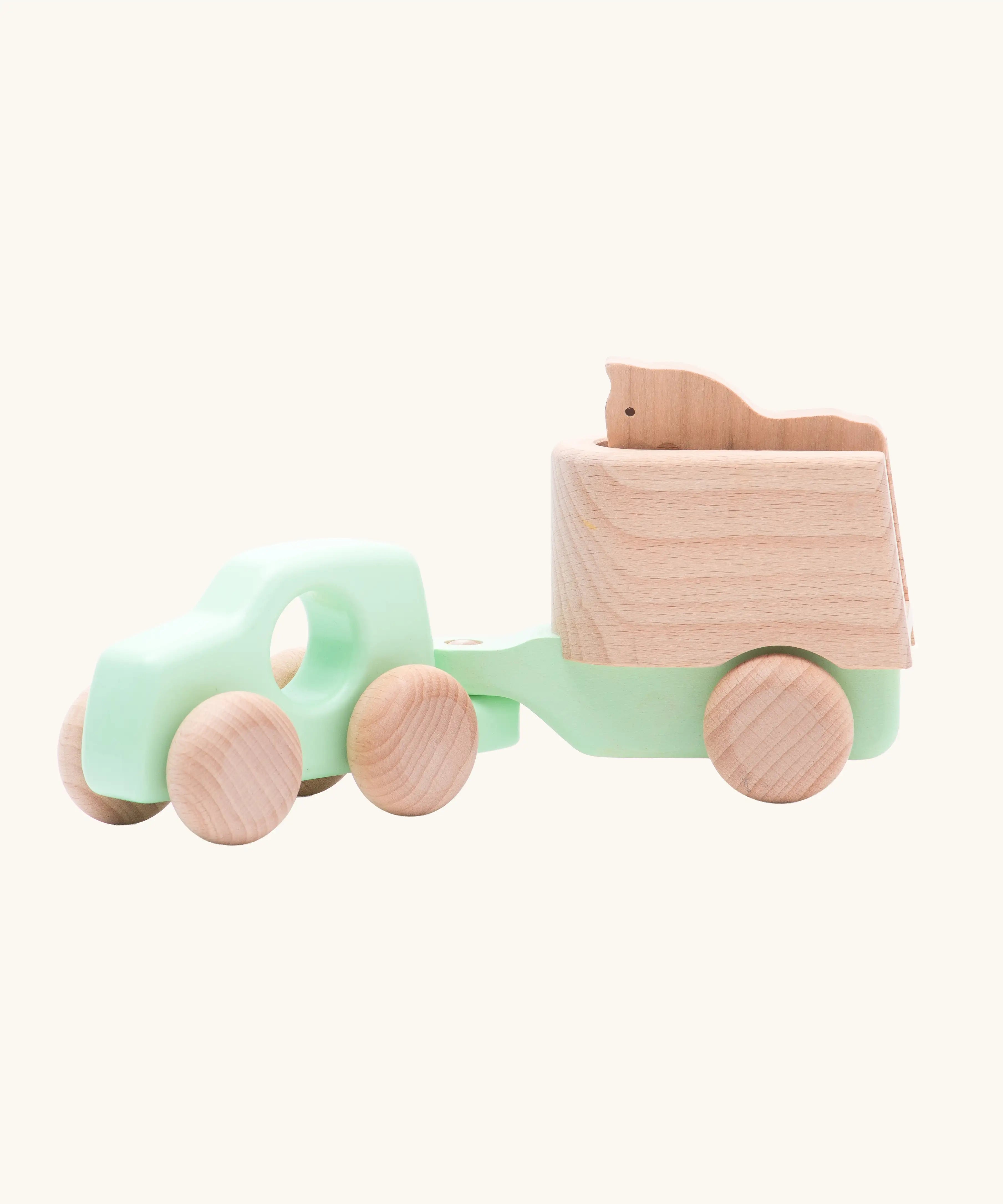 Bajo mint green 4x4 car and horse trailer wooden toy.