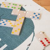 Bajo children's XXL wooden dominos game laid out on a blue and white carpet