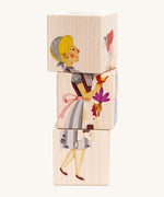 Bajo Cinderella Turning Storytelling Blocks. Three wooden blocks attached to each other that turn to reveal a part of a character on each piece. These heirloom quality toys by Bajo are part of a wide range of wooden toys available here at Babipur. 