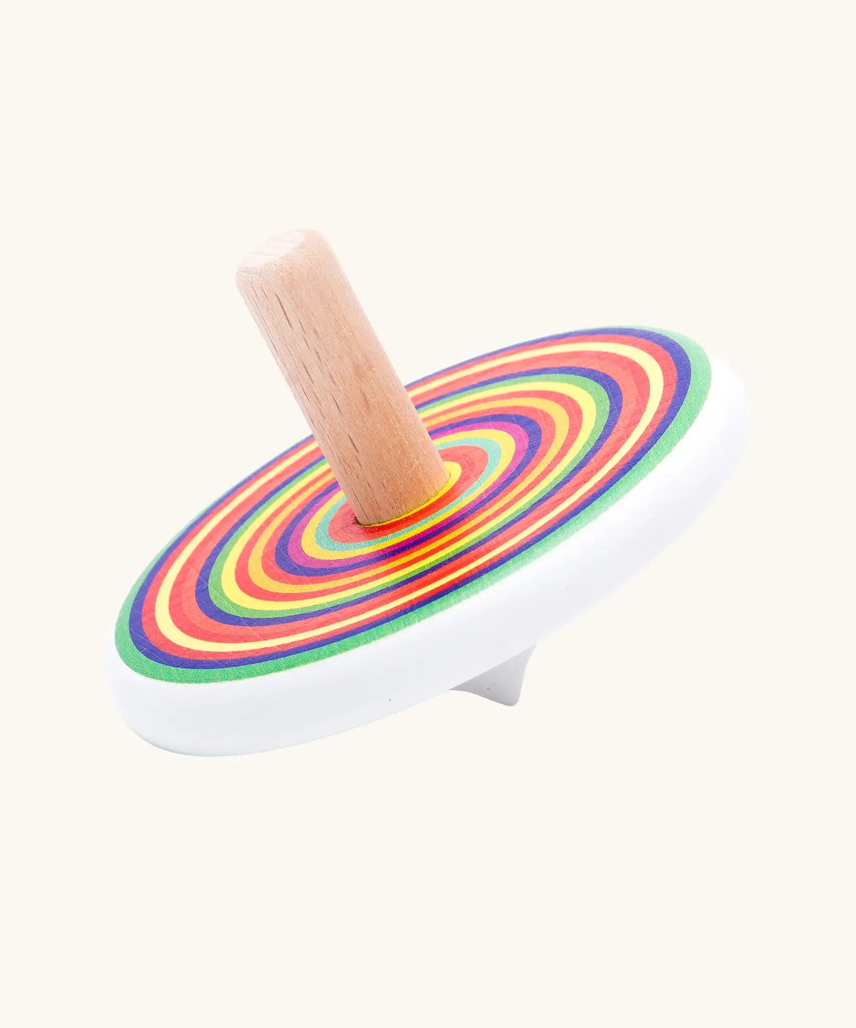 Bajo colourful circles spinning top wooden toy. White painted wooden base with a rainbow stripe decorated top and a natural wood handle.