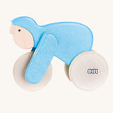 A blue Bajo Velo cyclist wooden toy. This wooden toy is part of a wide range of push along toys available at Babipur.