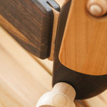 Close up of the flexible leather joins on the Bajo pull along dachshund toy dog