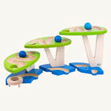 Bajo toys wooden dewdrop ball run. A wooden ball run with a blue painted base and green painted dew drop shaped platforms. 