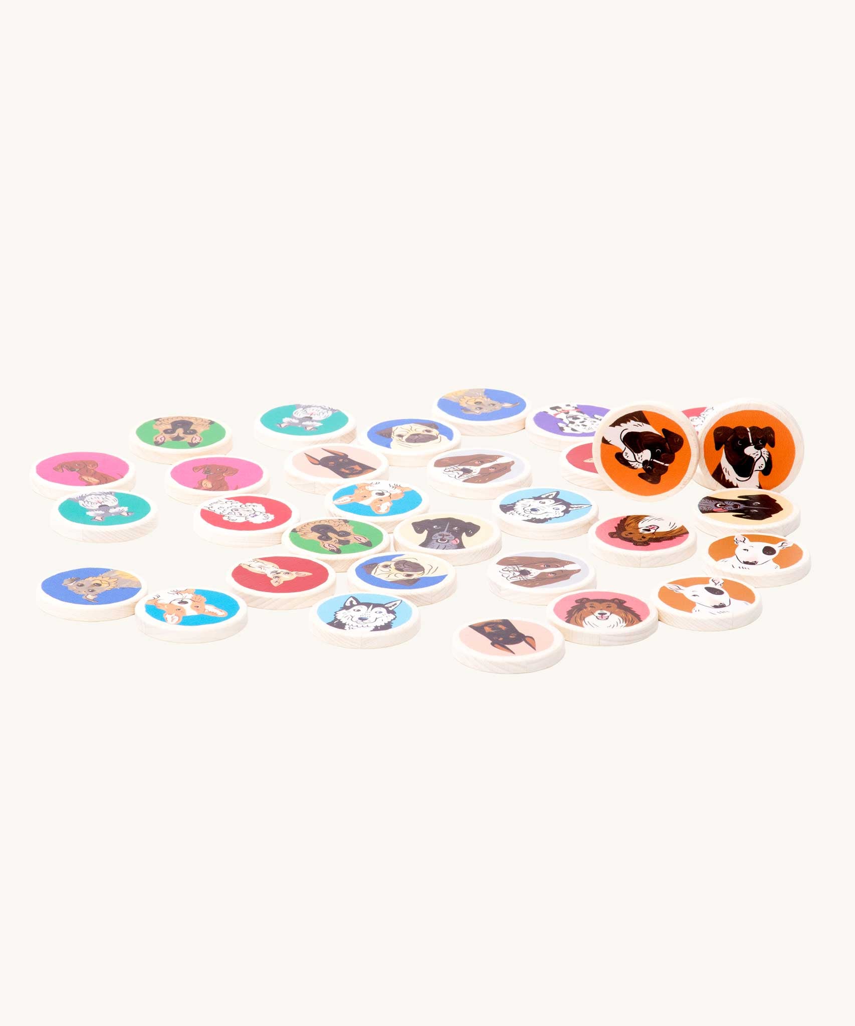 Bajo Dogs Memory Game. A set of 32 wooden discs featuring 16 different dog breeds printed on one side. These heirloom quality toys by Bajo are part of a wide range of wooden toys available here at Babipur.