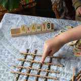 Bajo toys wooden easy maths learning set.  A wooden educational set that comes with double sided number tiles and Japanese grid sticks. 