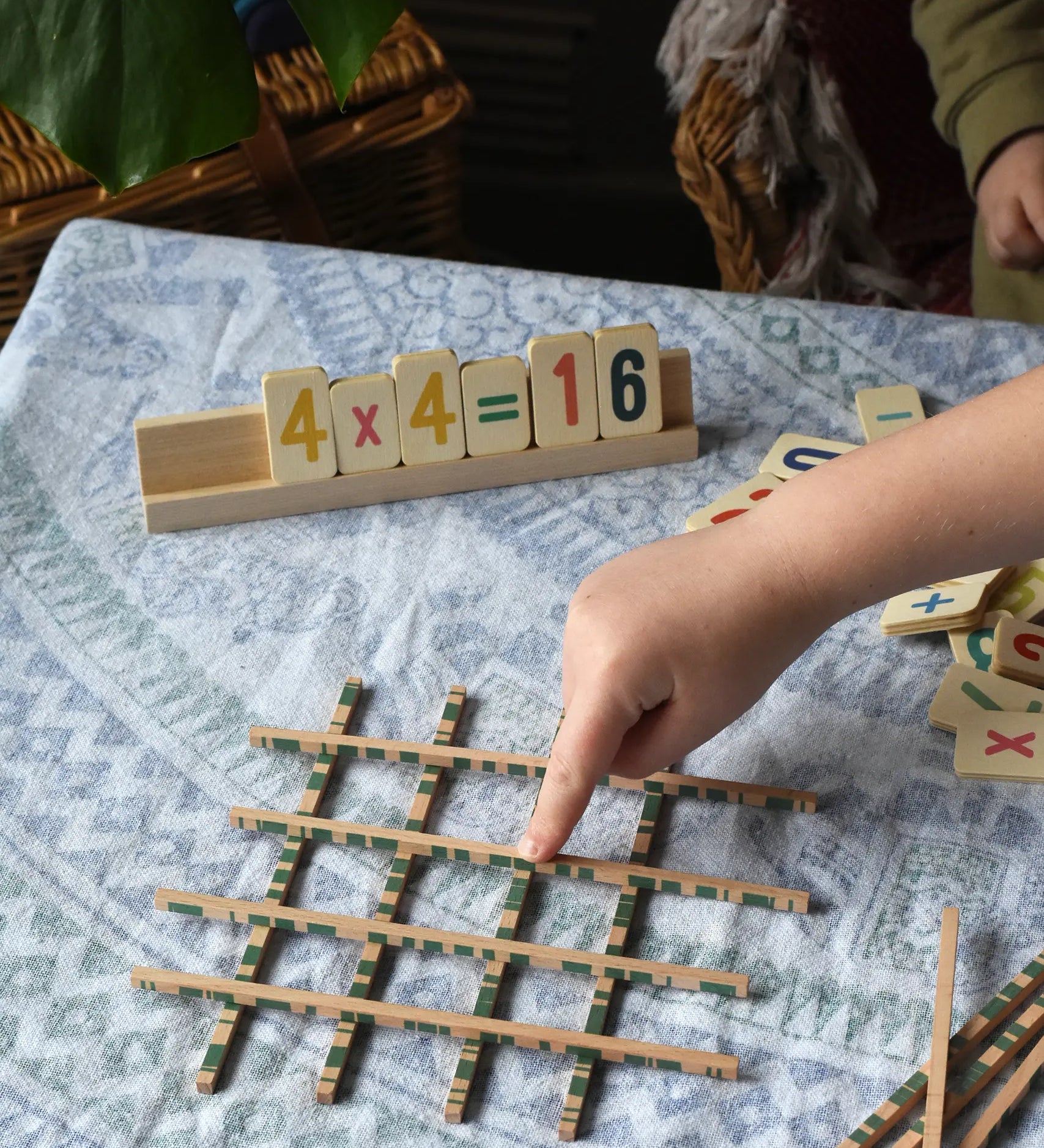 Bajo toys wooden easy maths learning set.  A wooden educational set that comes with double sided number tiles and Japanese grid sticks. 