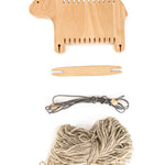 Pieces of the Bajo sustainable wooden weaving sheep set laid out on a white background