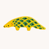 Bajo pangolin Endangered Animals wooden toy Figure. A yellow painted, pangolin shaped animal figure decorated with green and black details. These heirloom quality toys by Bajo are part of a wide range of wooden toys available here at Babipur.
