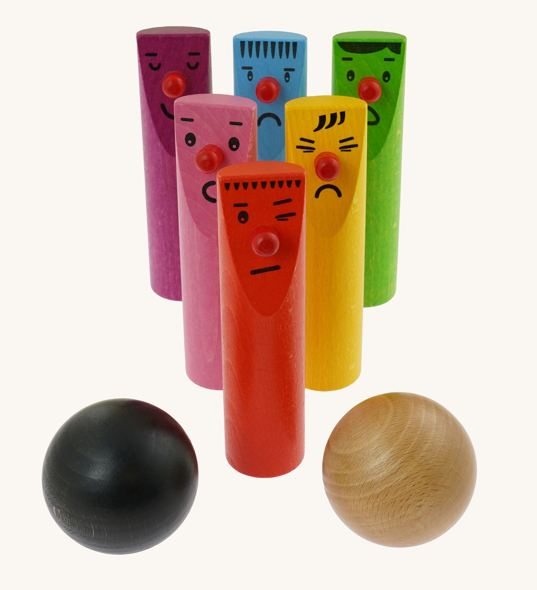Bajo Fellow Skittles wooden toy game. Six coloured wooden skittles decorated with faces with red noses. The set comes with two wooden balls.  These heirloom quality toys by Bajo are part of a wide range of wooden toys available here at Babipur.