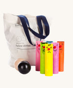 Bajo Fellow Skittles wooden toy game. Six coloured wooden skittles decorated with faces with red noses. The set comes with two wooden balls and a tote storage bag.  These heirloom quality toys by Bajo are part of a wide range of wooden toys available here at Babipur.