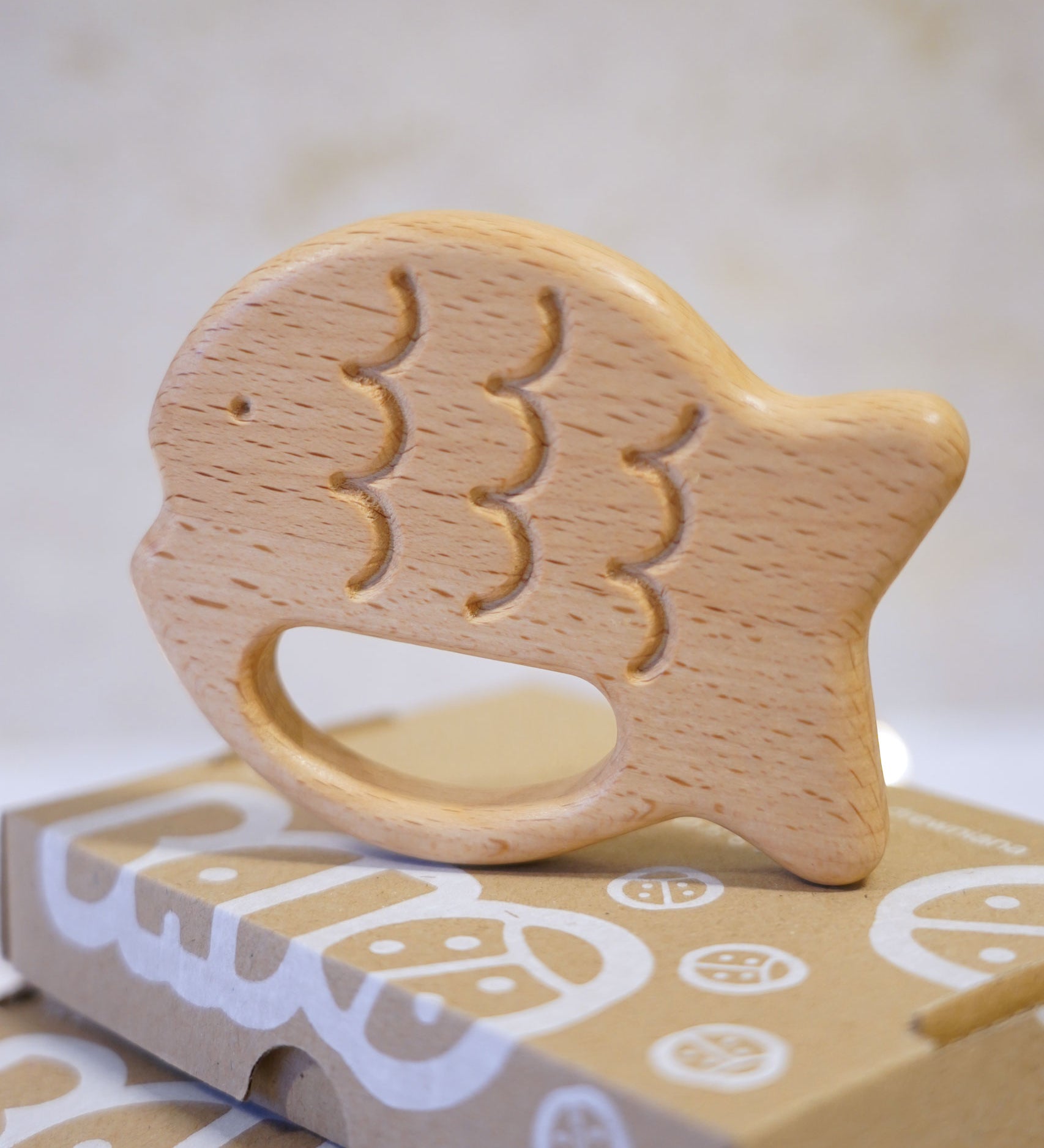 Bajo Fish Teether wooden fish shaped teetehr toy. These heirloom quality toys by Bajo are part of a wide range of wooden toys available here at Babipur. 
