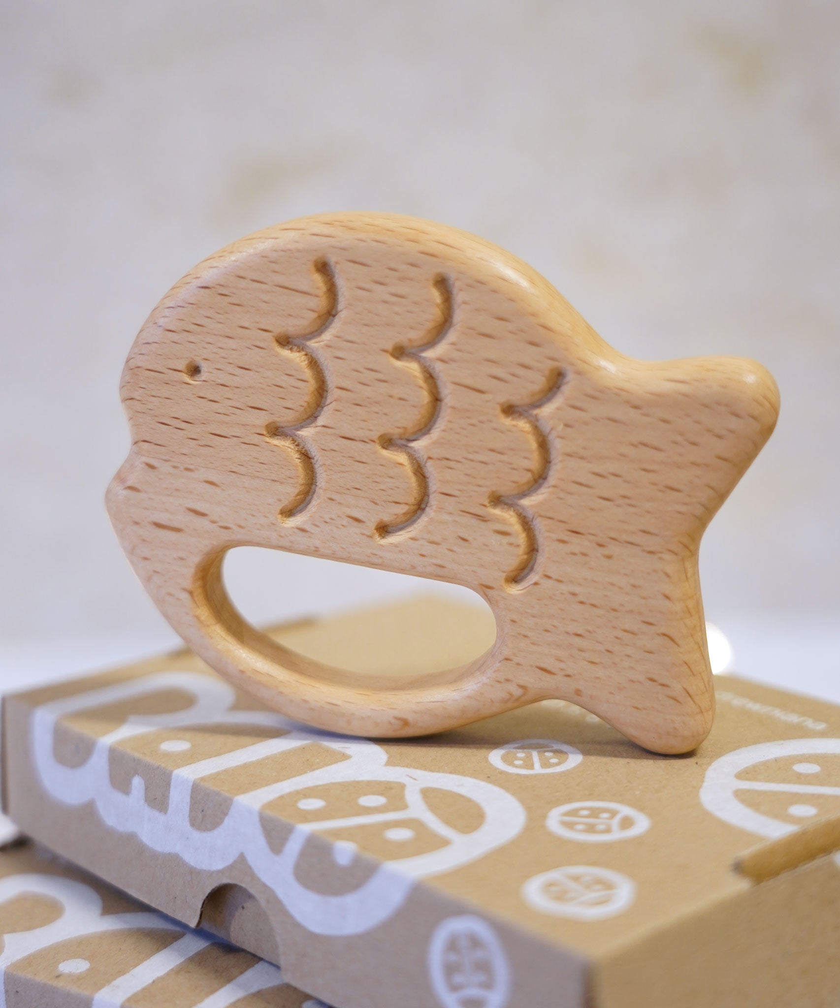 Bajo Fish Teether wooden fish shaped teetehr toy. These heirloom quality toys by Bajo are part of a wide range of wooden toys available here at Babipur. 