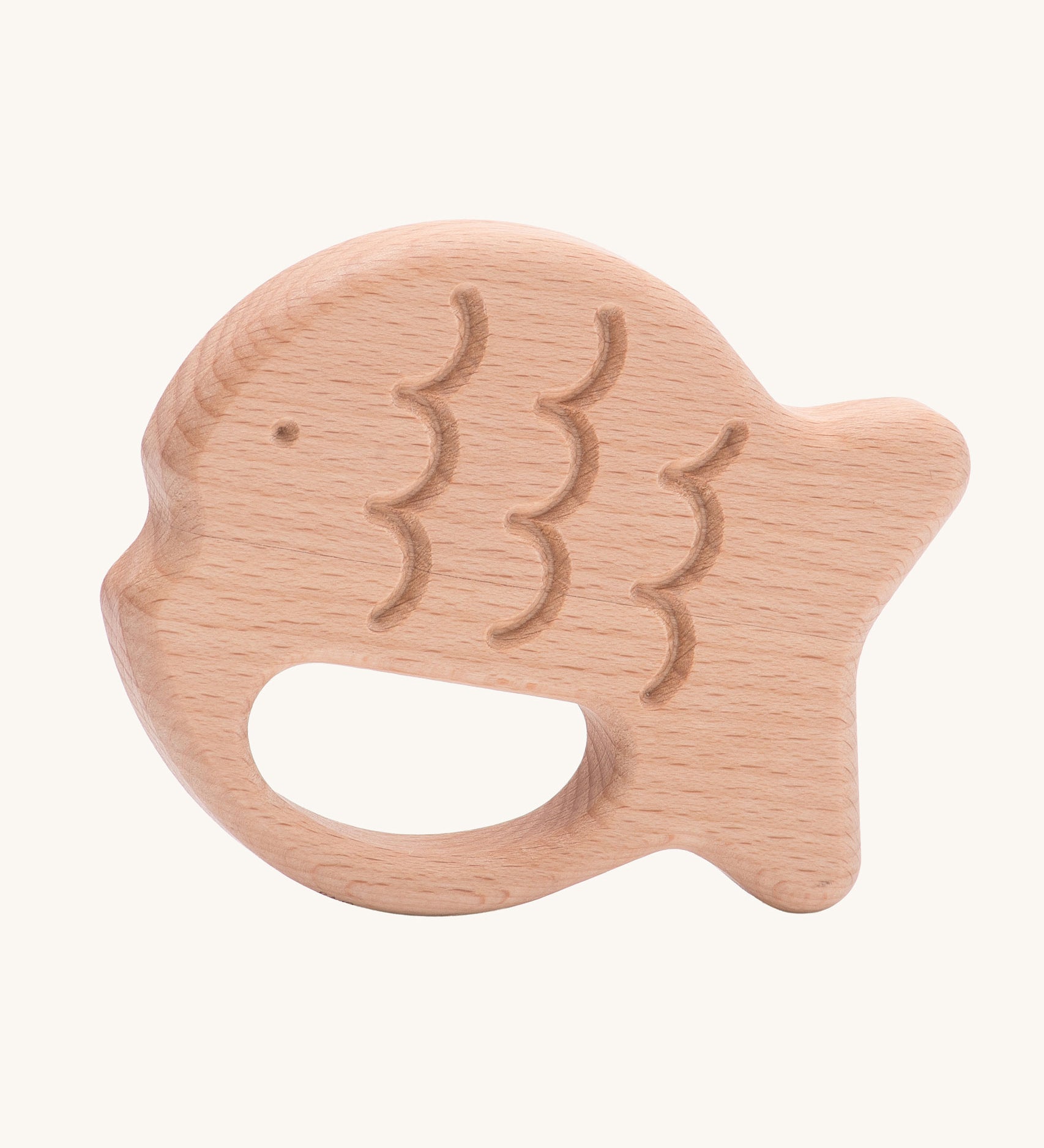 Bajo Fish Teether wooden fish shaped teetehr toy. These heirloom quality toys by Bajo are part of a wide range of wooden toys available here at Babipur. 