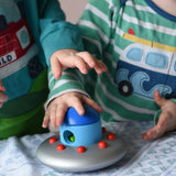 Children playing with the Bajo Alien Flying Saucer.